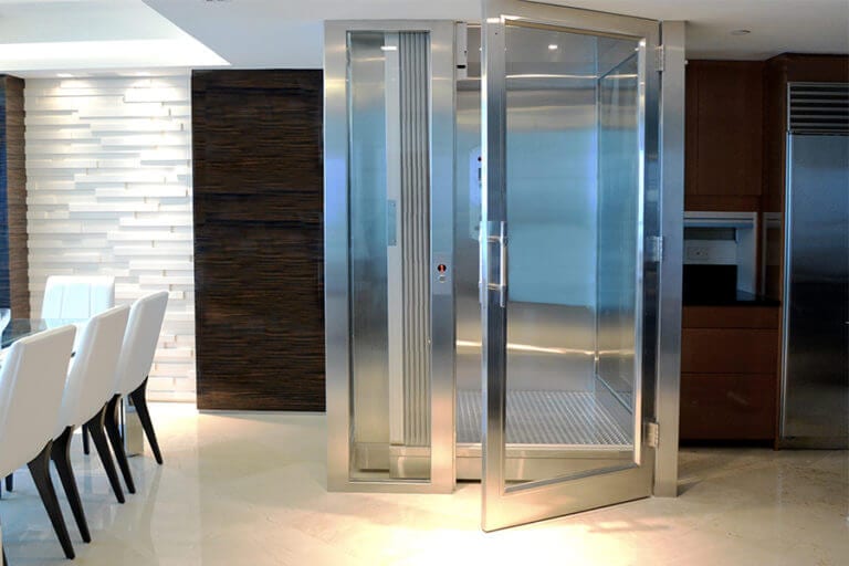 Glass and stainless steel home elevator