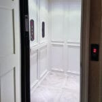 Symmetry Custom Home Elevator Car with Raised Panels