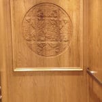 Symmetry LULA Church Elevator Customized Engraved Cab Wall in St Mikes installed by Arrow Lift