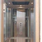 Symmetry Residential Elevator glass and stainless steel installed by Morning Star