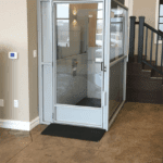 Symmetry Vertical Platform Lift Enclosed in Commercial Setting installed by Adaptive Environments