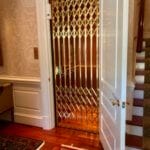 Brass Gate Closed on Symmetry Home Elevator