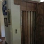 Symmetry Home Elevator Wood Accordion Gate