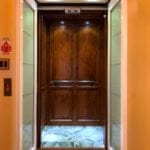 Symmetry Residential Elevator Dark Car Panels Custom Flooring