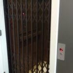 Symmetry Residential Elevator with Vintage Bronze Enterprise Gate