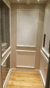 Home Elevator with White car panel picture framing