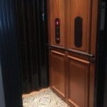 Symmetry Home Elevator Raised panel Cherry Clear Coat