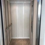 Interior view Symmetry LULA Elevator steel cab applied panels