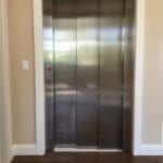 Three Speed Stainless Steel Door on Symmetry Home Elevator