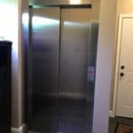 Two Speed Stainless Steel Landing Door on Symmetry Home Elevator