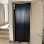 Symmetry Home Elevator with 3 Panel Safety Door