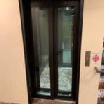 Symmetry LULA Elevator with laminated glass car and hoistway doors