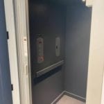 Symmetry Home Elevator with painted Flat Car Panels Brushed Stainless Steel Fixtures