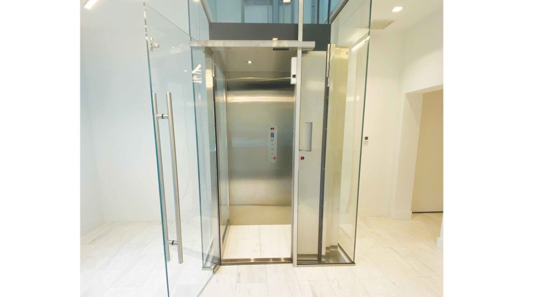 Symmety Custom Home Elevator Stainless Steel Car in Glass Hoistway