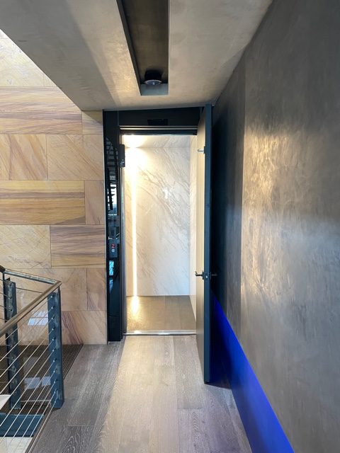 Custom Home Elevator in Marble with Beautiful Lighting