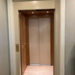 Symmetry Home Elevator Straight Through Configuration Ivory Two Speed Doors