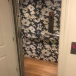 Symmetry Home Elevator with custom wall covering by others